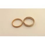 A 22ct gold band 3.4gms approx, along with an 18ct gold band 6.