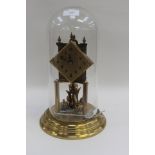 A mid 20th Century German clock under glass dome (key)