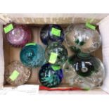 Eight assorted glass paperweights