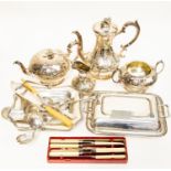 A four piece 20th Century stainless tea set with other items