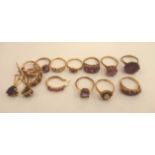 A quantity lot of 9ct hallmarked seven purple amethyst and paste stone set rings,