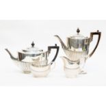 A late Victorian matched silver four piece tea and coffee service in the Georgina manner with