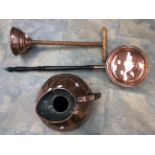 A Victorian large copper flagon together with punchon and bed warmer (3)