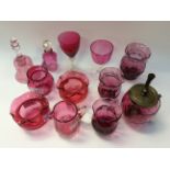 Twelve items of Cranberry glass