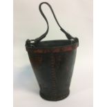 A leather fire bucket,