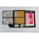 A Mahjong set (plastic and bamboo) plus small Chinese scrolls