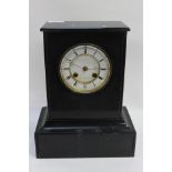 A black Belgian marble mantle clock