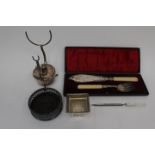 Boxed Edwardian fish servers, splint kettle base, Penhaligon pot holder, paper knife,