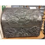 A Victorian pewter casket with embossed foliate design,