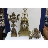 Large late 19th Century brass mantle clock with candelabra's,