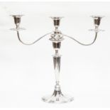 A three branch candelabra filled, Birmingham 1913, gross weight 53.03 Troy oz, 1649.