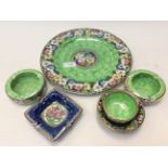 Maling ware, a large plaque, two ashtrays and a small bowl,