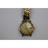 A Gentleman's Omega yellow metal wrist watch,