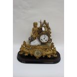 A 19th Century French gilt metal mantle clock with Oriental dial (no key present) Female standing