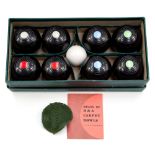 A boxed set of circa 1950's B&A carpet bowls,