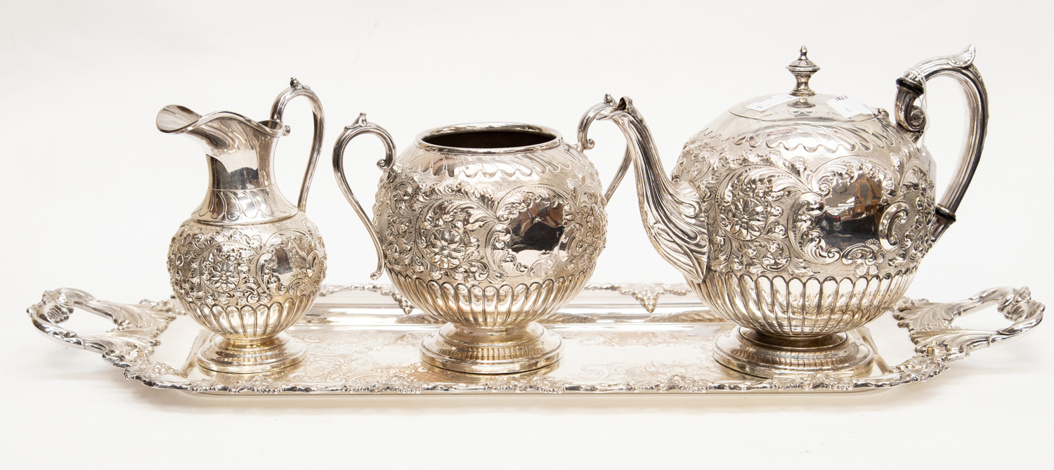 A Victorian style large silver plate tea service including tea pot, sugar bowl, milk jug,