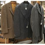 A collection of suits and a tweed jacket to include a wool grey pinstripe (Boss) a grey waisted