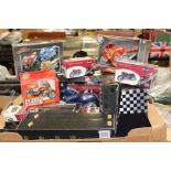 Two trays of boxed and unboxed motorcycle models
