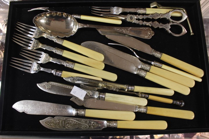 A quantity lot of EPNS flat wares with bone handles and grape scissors etc (1 bag)