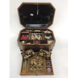 A Chinese export black lacquered and gilt decorated combination sewing and writing box,