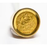 A half sovereign coin ring on a nine carat gold mount