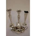 Silver single candlestick Birmingham 1917, together with a similar other short candlestock,