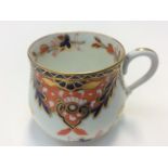 A Davenport barrel shaped cup, decorated in the imari style, Pattern No.