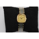 Omega, a lady's bi-metal Omega De Ville wristwatch, 2cm square gilt dial with baton numerals,