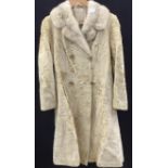 A Palomino pony skin 1970's double breasted coat with an off white/grey collar