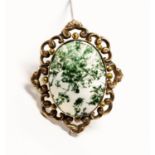 A Victorian gold large oval brooch set with moss agate