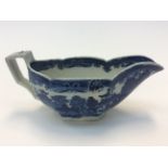 An early 1800's blue and white sauce boat (Pearl ware)