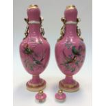 A pair of English porcelain vases and covers,