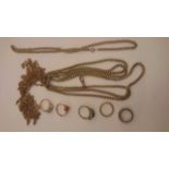 Yellow metal chains including guard chain,