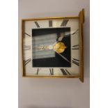 A Jaeger Lecoultre brass mantle clock complete in box with paperwork dated 1972