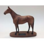 A Beswick - connoisseur model on stand of "Arkle" the Champion Steeplechaser