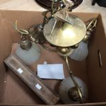 A brass gas light with shade,