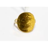 A Victorian half sovereign formed as a ring on a unmarked yellow shank high carat,