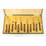 Twelve piece Italian gilt gold on silver knives and forks