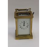 A French brass carriage clock, c.