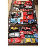 Three trays of large scale modern diecast vehicles by Bburago,