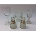 A pair of cut glass cologne bottles, small with stoppers and silver collars, Birmingham 1900,
