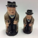 A Royal Doulton Winston Churchill medium Toby jug, together with a smaller version,