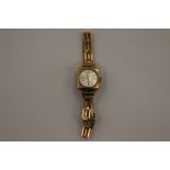 A Ladies 9 carat gold Accurist wrist watch, gold plated,