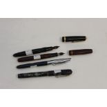 Four vintage fountain pens