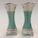 A pair of early Derby footed vases,