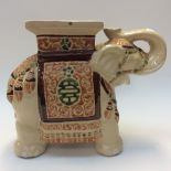 A Chinese Elephant stool or plant pot holder,