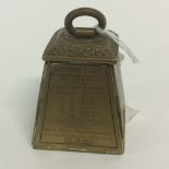 A brass Avery folding letter post, opening to reveal a cushion to the interior,