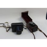 A leather cased Flexaret Meopta Belar 1-80mm, case lined with maroon velvet,