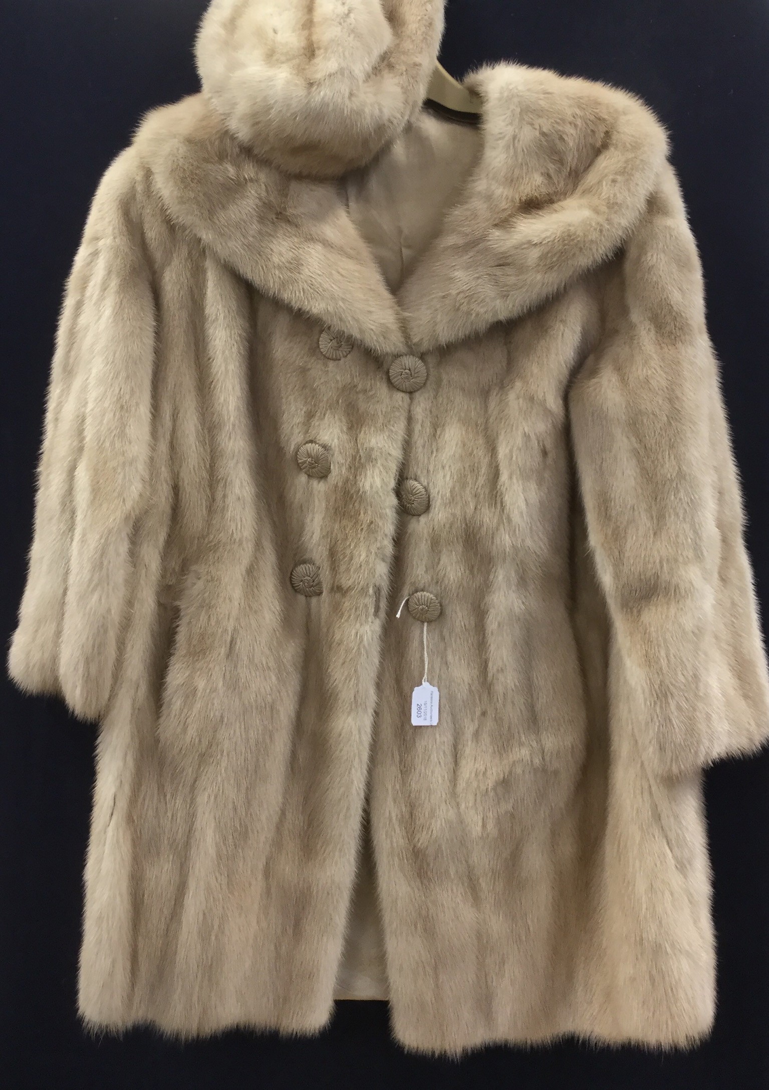 A cream mink 3/4 coat with shawl collar double breasted and a matching beret hat (2)
