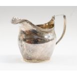 A white metal jug, dated 1835, William IV,